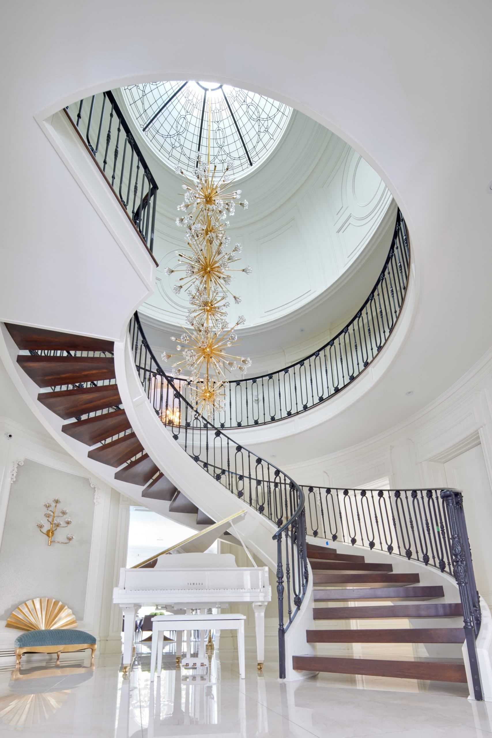 A curved staircase, an example of the joinery detail in a Pahlevan Homes build